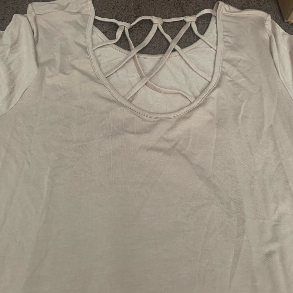 Solid tunic with cross strap back